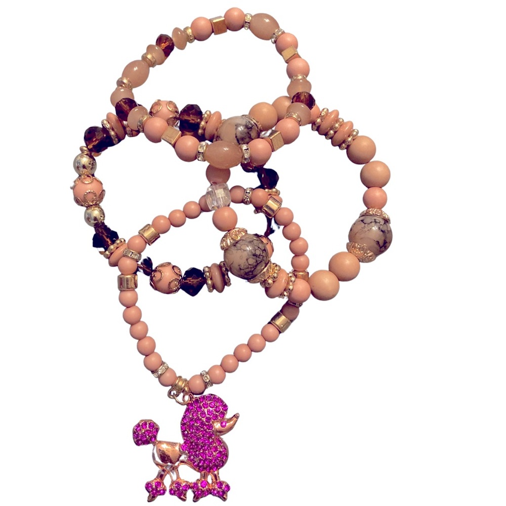 Who is ready for that pink poodle bling?🐶💎